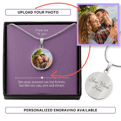 A black gift box with a photo necklace for personalized photo gift with engraving on the back. Unique gift idea.