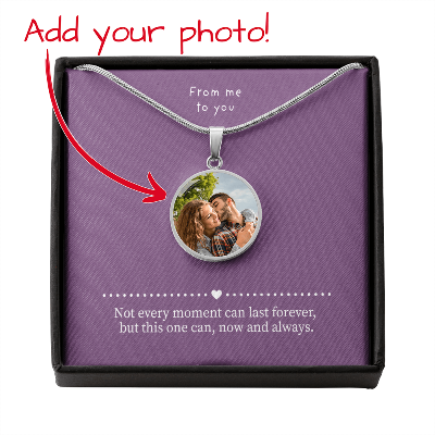 Unique photo necklace in a black gift box. The necklace is circle shaped and in silver color with message card.