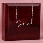 Elegant custom name necklace created with your chosen name, this one is displayed on a luxury gift box from I Got You a gift in the color silver.
