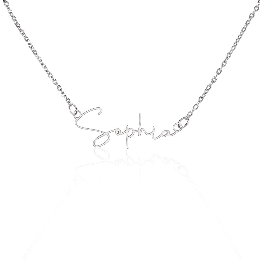 Custom name necklace, the color is silver. The name on the necklace is Sophia.
